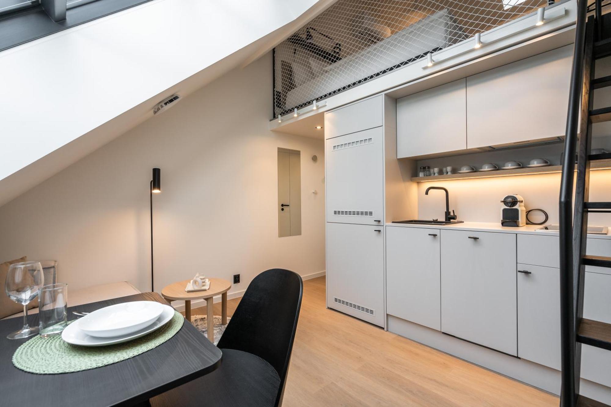 Honest Karlin Aparthotel Prag Rum bild