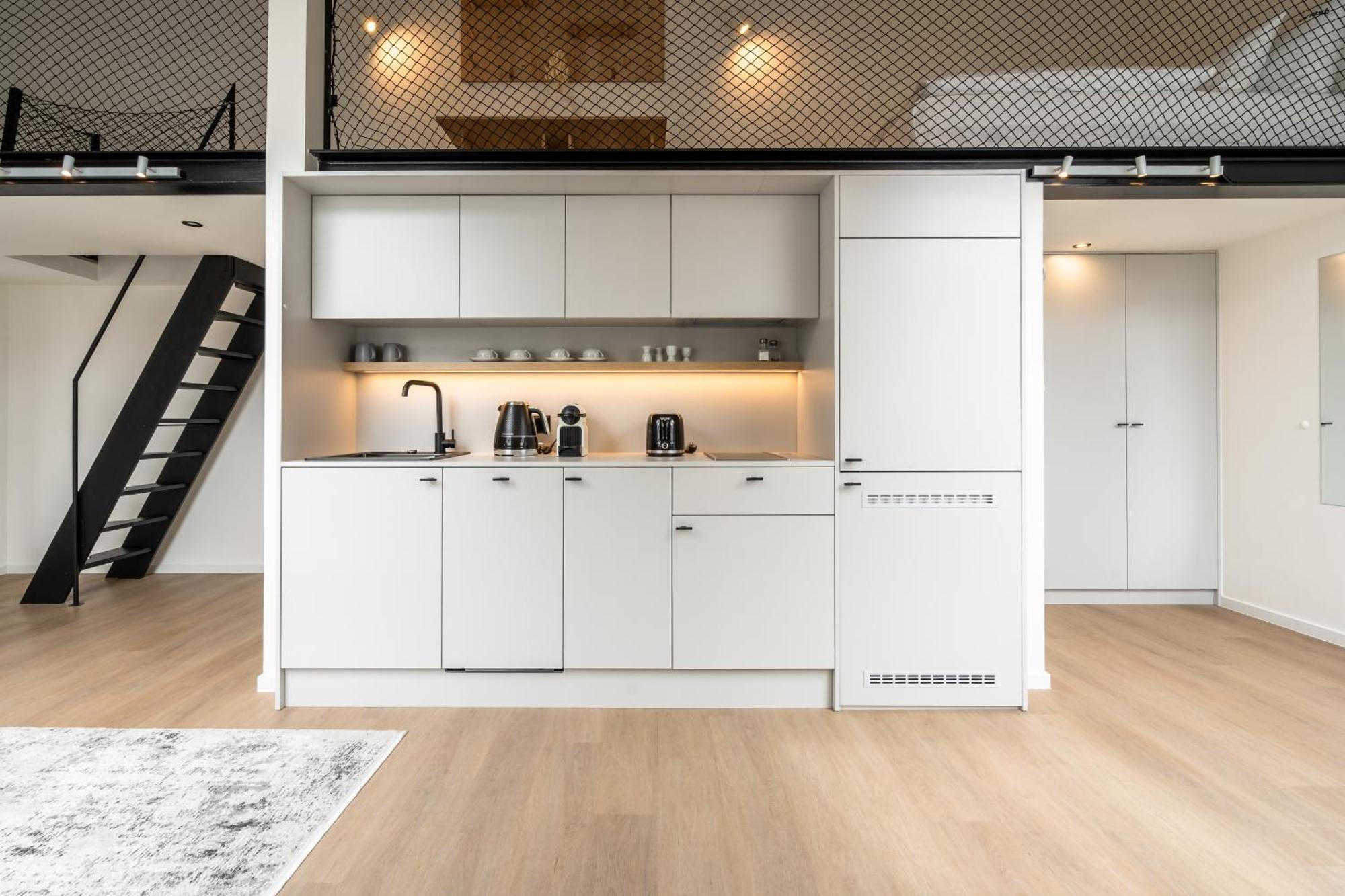 Honest Karlin Aparthotel Prag Rum bild