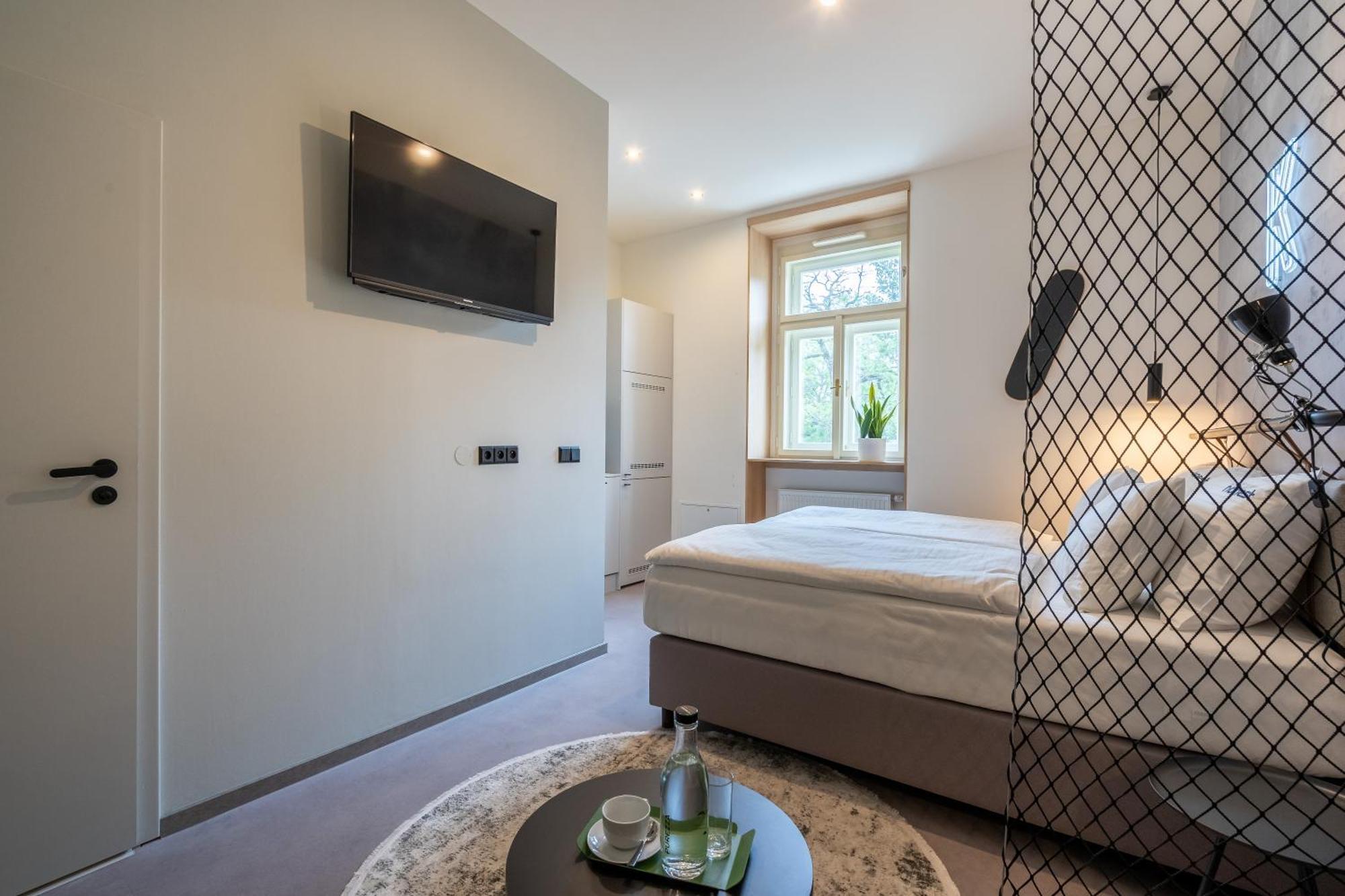 Honest Karlin Aparthotel Prag Rum bild