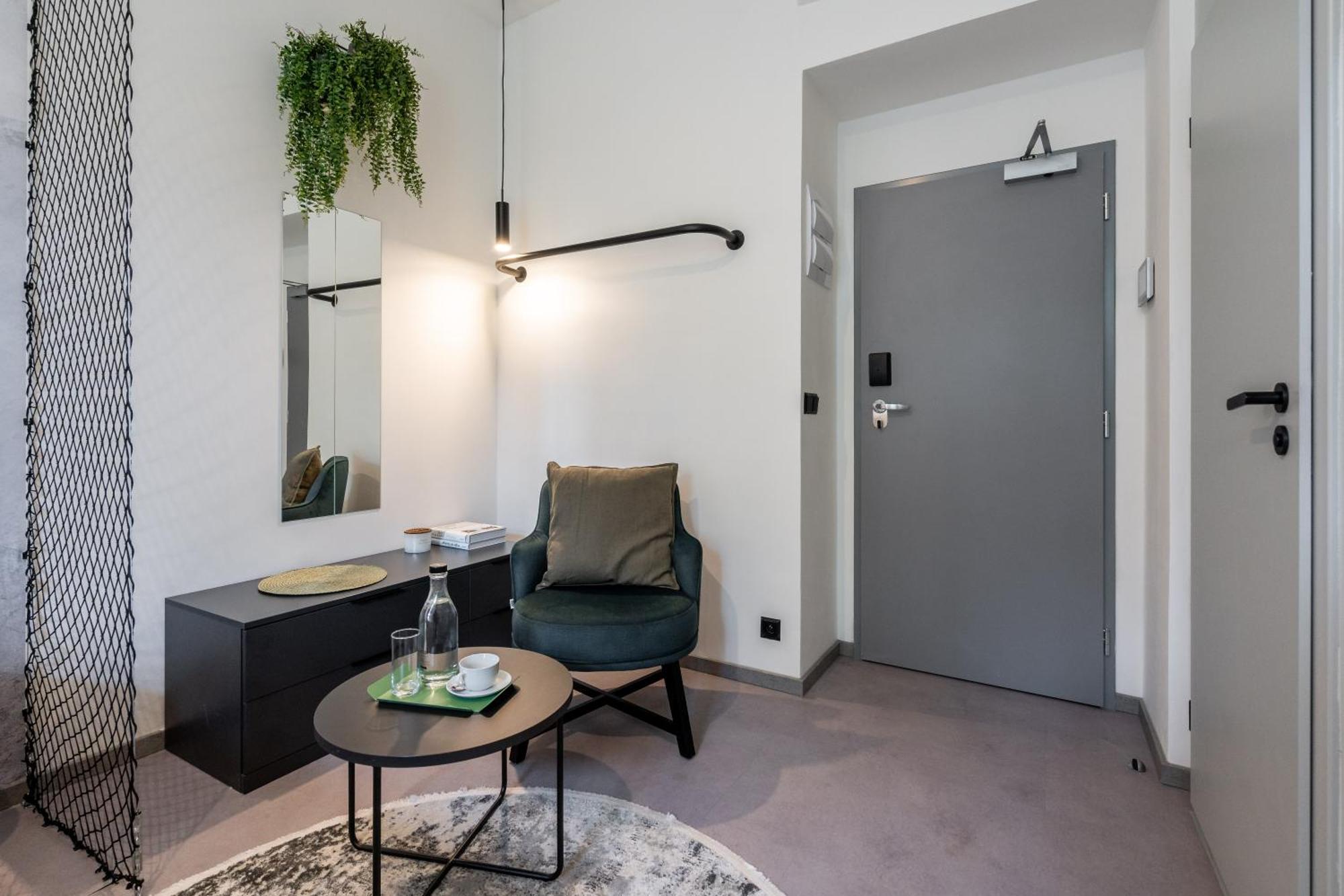 Honest Karlin Aparthotel Prag Rum bild