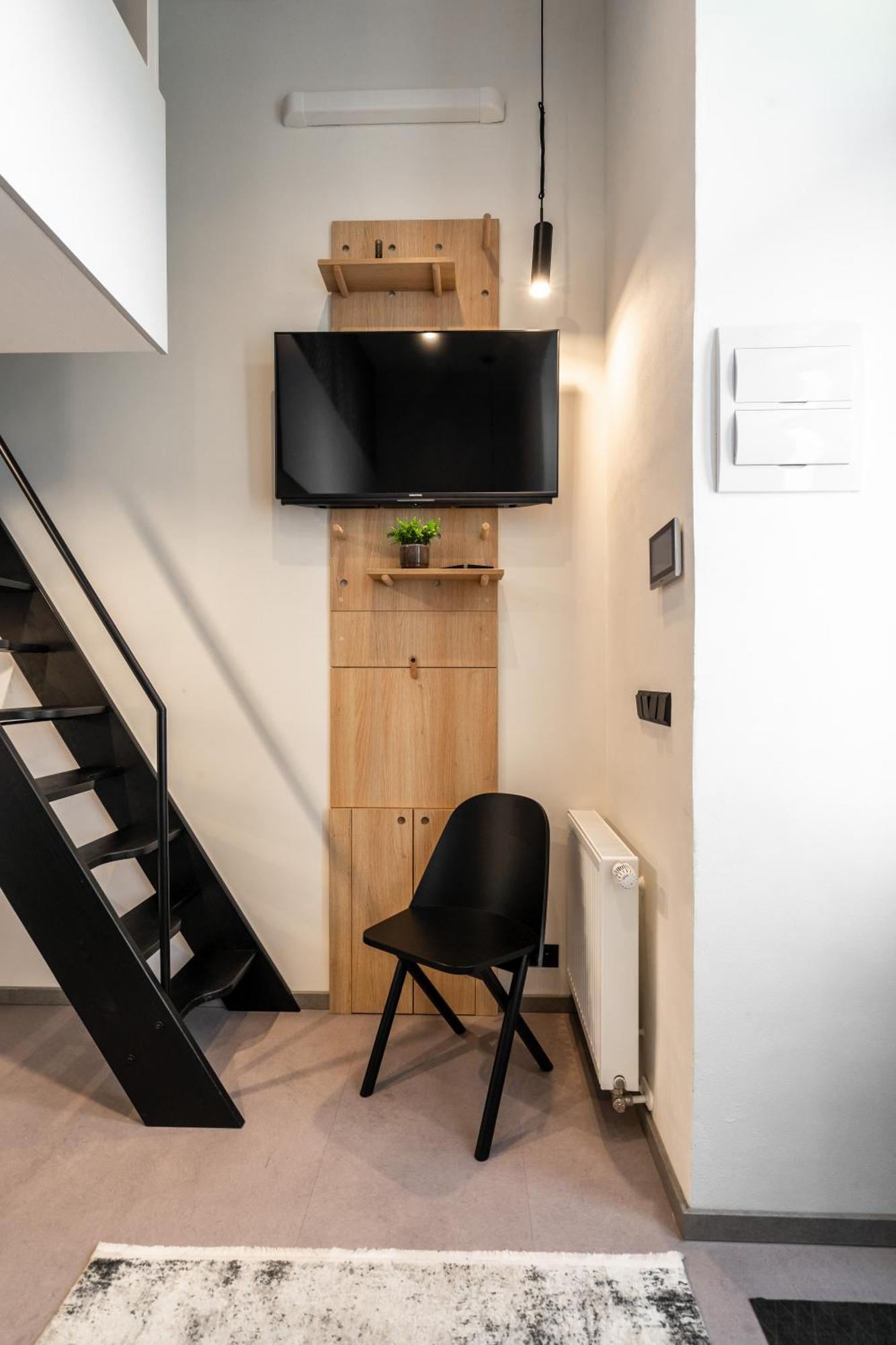 Honest Karlin Aparthotel Prag Rum bild